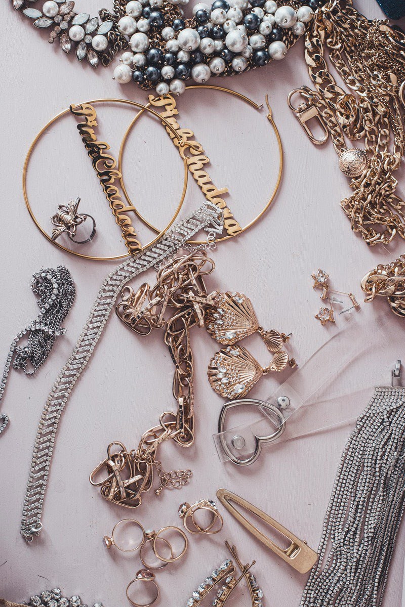 a mix of gold and silver jewelry