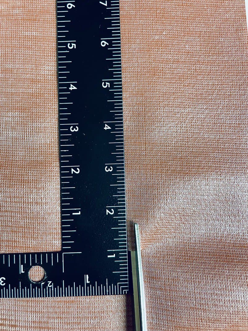cutting faux leather with a ruler