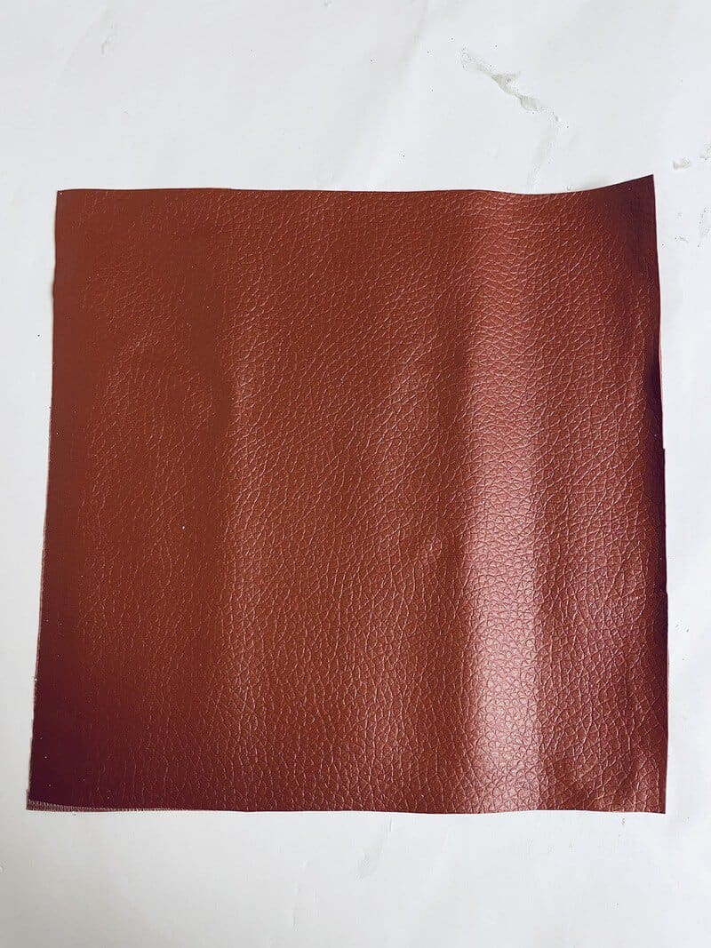 a sheet of brown faux leather
