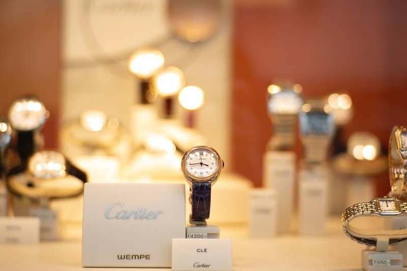 A row of diamond bezel watches