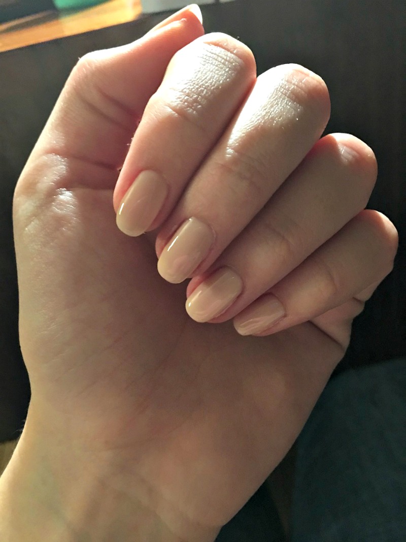 a woman with beautiful healthy nails