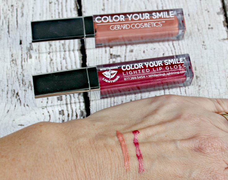 swatches for two shades of gloss on the back of a hand