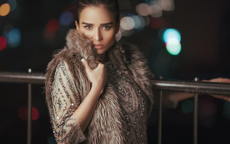 woman wearing a faux fur coat
