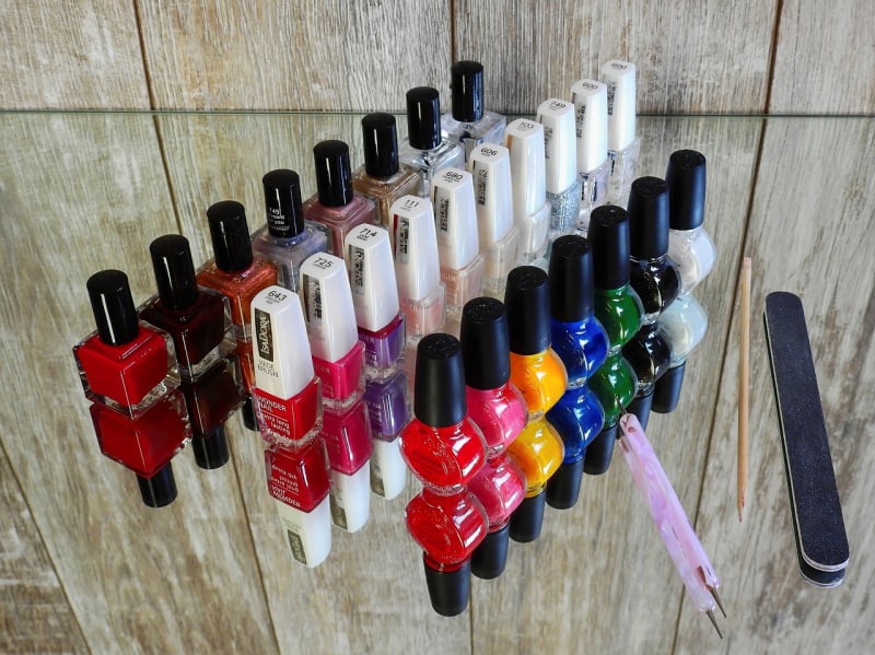 bottles of nail polish and manicure supplies