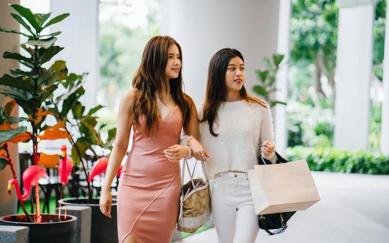 two women shopping for clothes