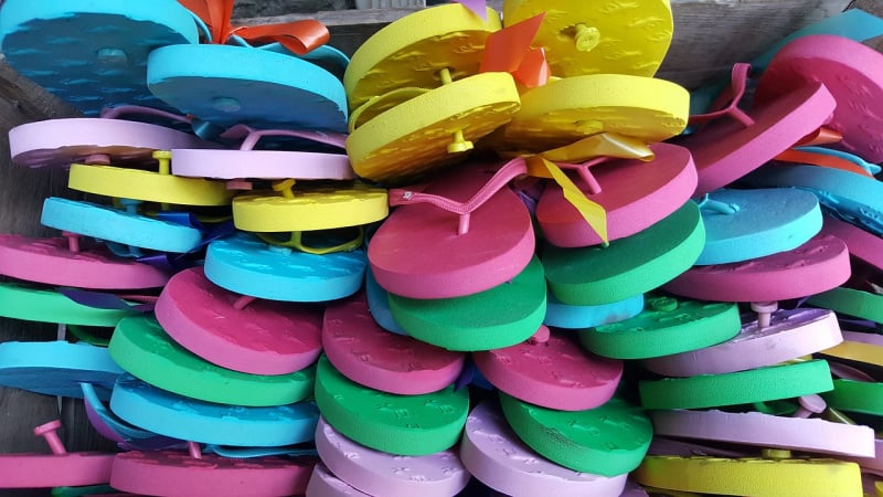stacks of colorful flip flops