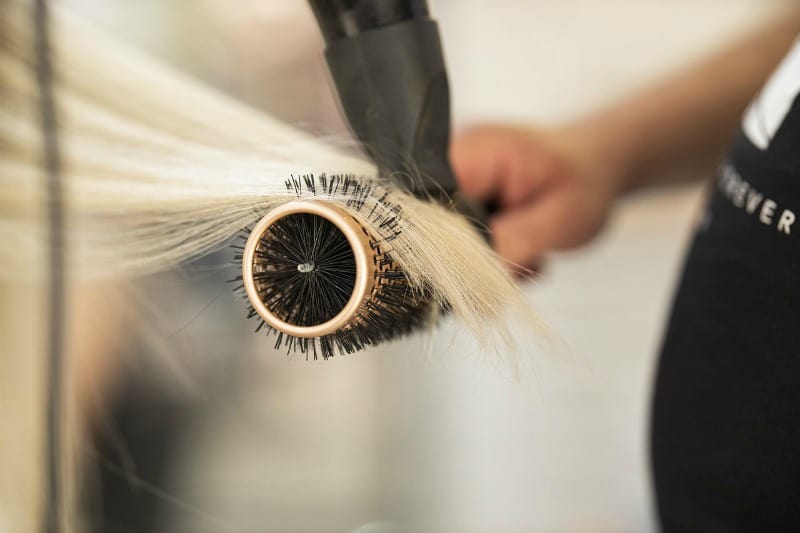 hair on a round brush being dryed