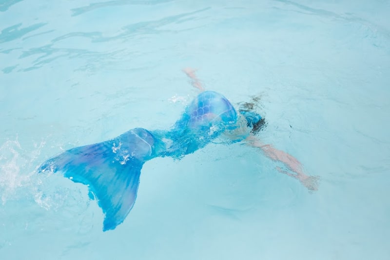 woman wearing a mermaid tail