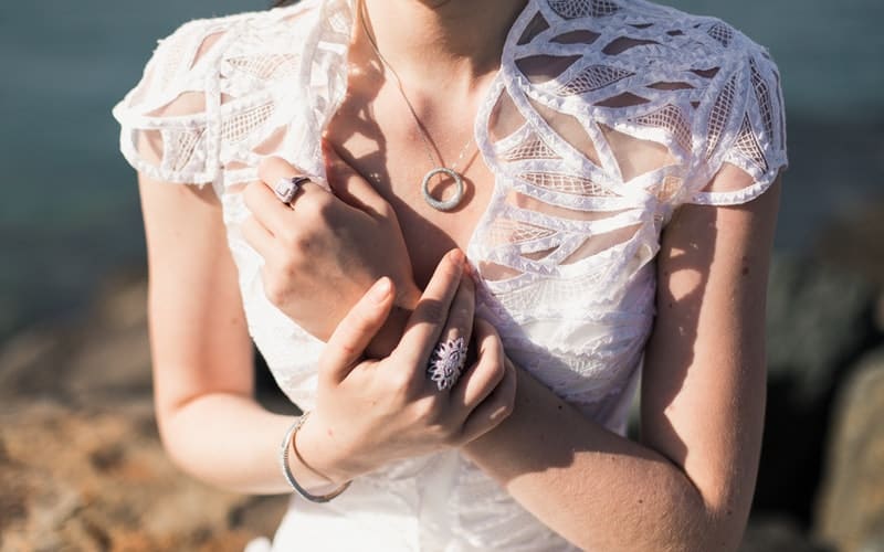 close up on a woman wearing a wedding dress
