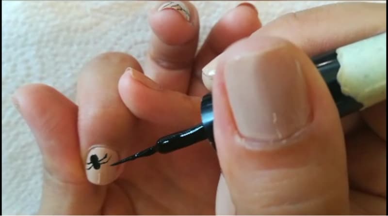 making a black spider on your nails