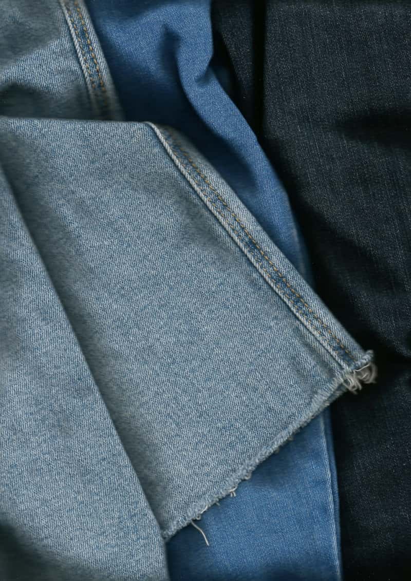 a close up of a raw hem on jeans