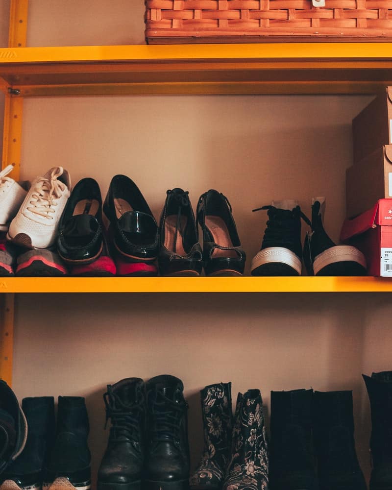 shoes stacked on shelves