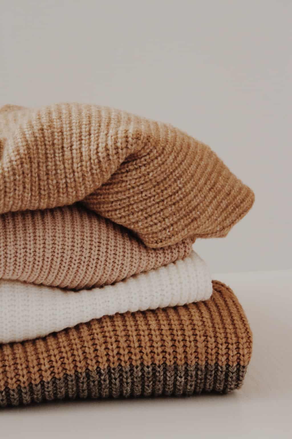 stacks of wool sweaters
