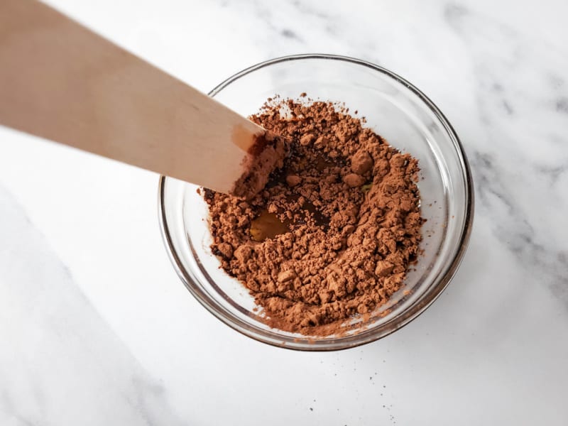 mixing cocoa powder and oil