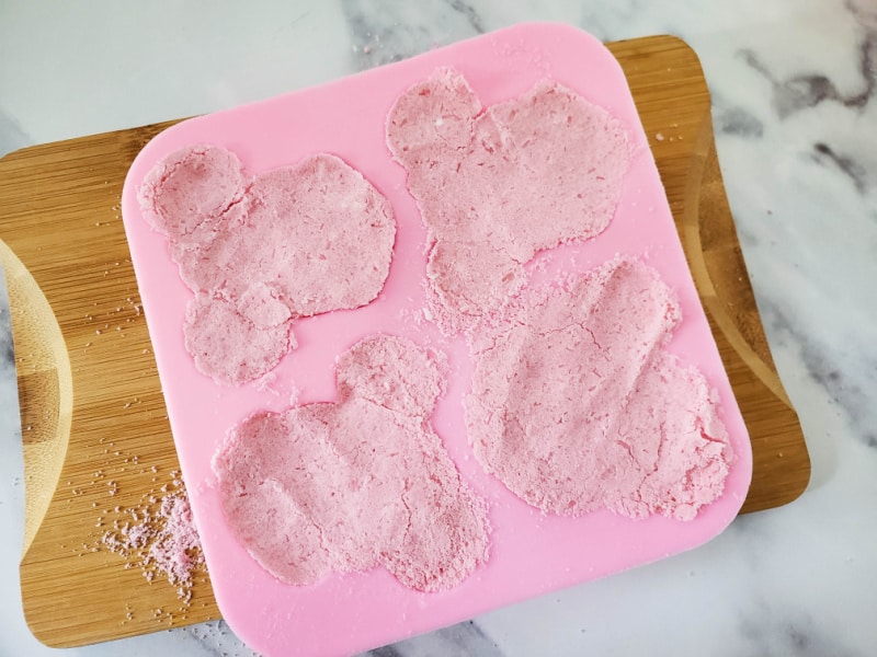 bath bombs in a pink mold