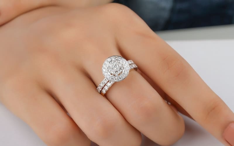woman wearing a simulant diamond ring