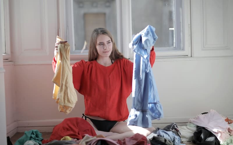 woman decluttering clothes