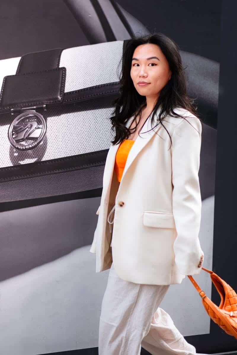 woman wearing a white suit