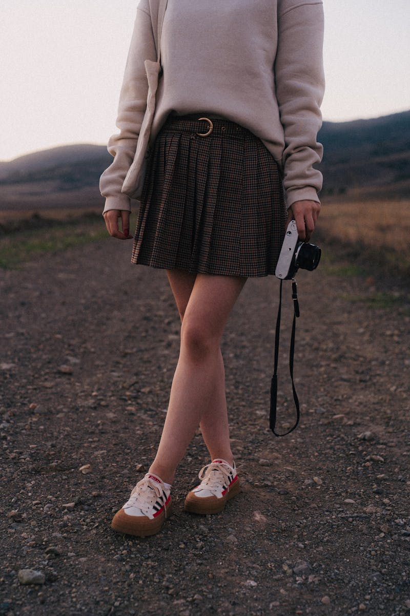 woman wearing a casual skirt sweater outfit