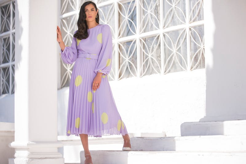 woman wearing purple Easter dress